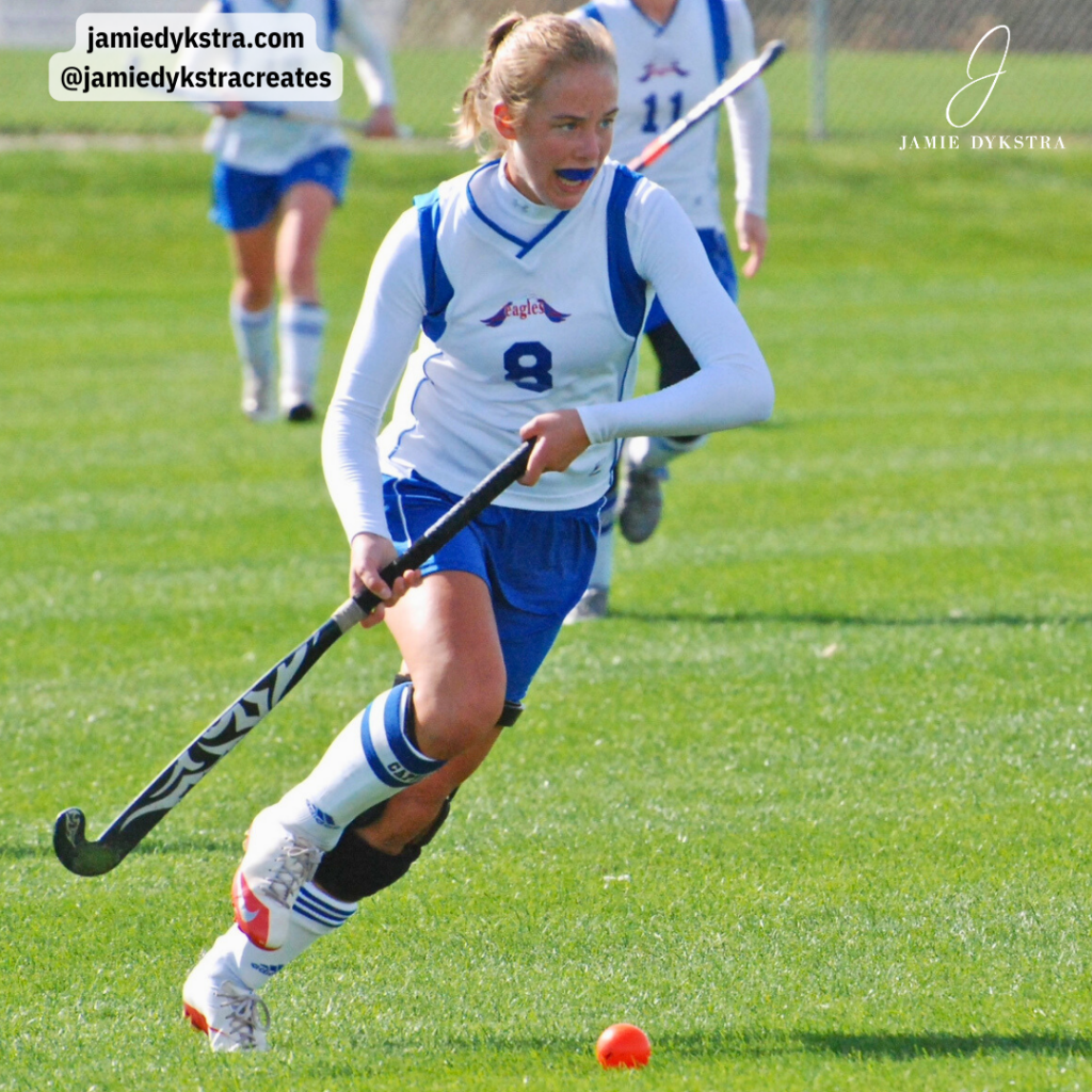Jamie playing field hockey