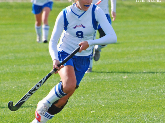 Jamie playing field hockey