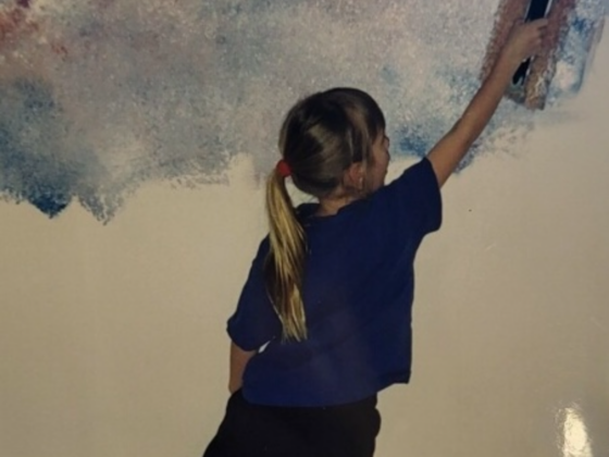 Me painting a wall
