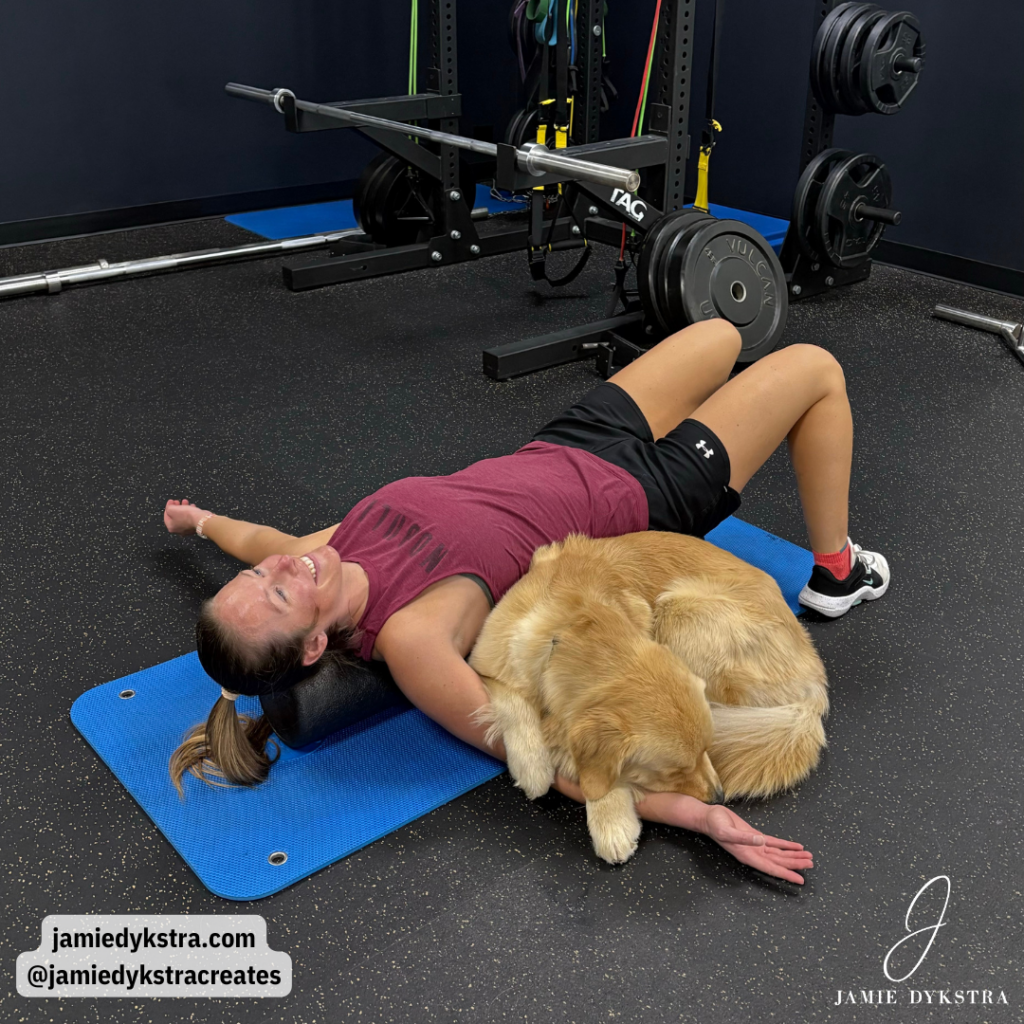 Me stretching with my Golden Retriever laying on my arm.