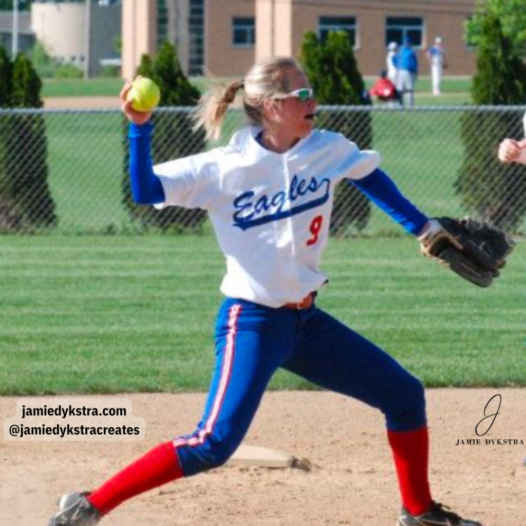 A picture of me playing softball in high school throwing the ball from the shortstop position.