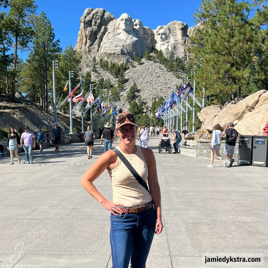 A photo of me standing in front of Mount Rushmore