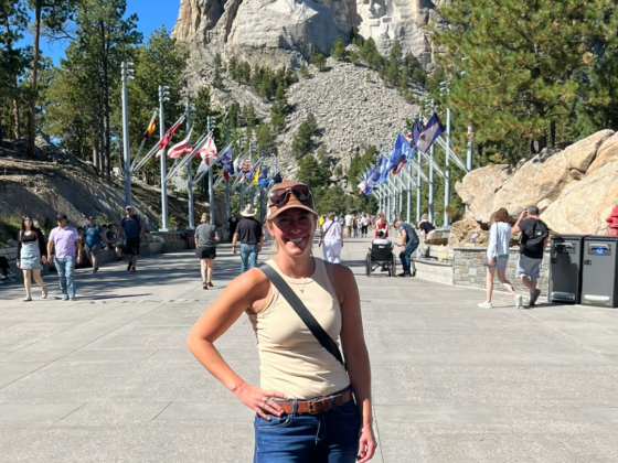 A photo of me standing in front of Mount Rushmore